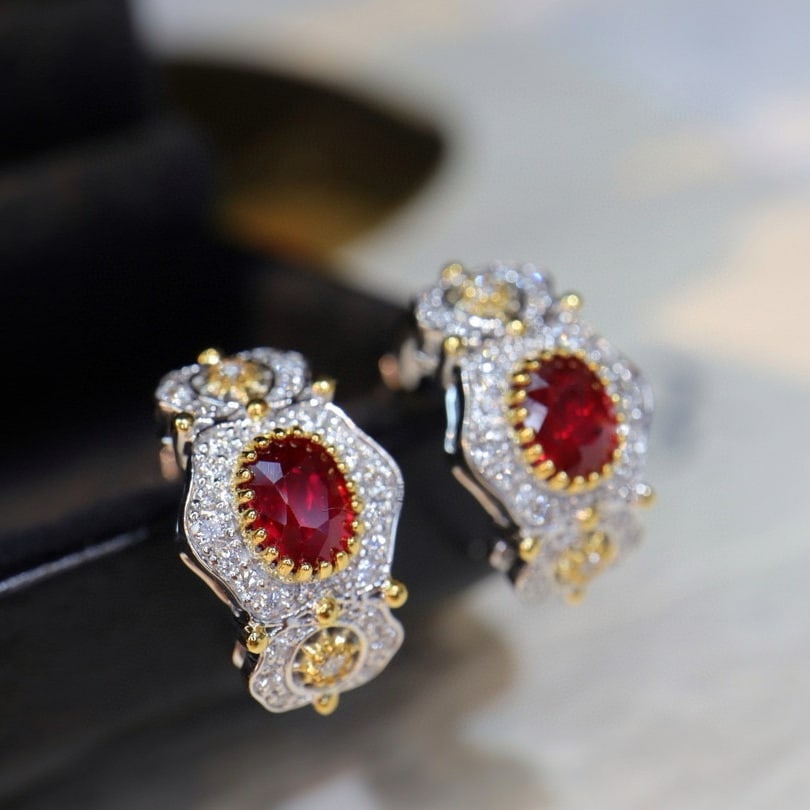14k Gold 1.39 Ctw Natural Ruby & Diamond Earrings: Ref:231001217 // gold content:14k gold // main gemstone:ruby // shape:oval // carat weight:1. 06ct // color:red // treatment:natural // // adjacent gemstone 2 : diamond // shape:round // carat weight: