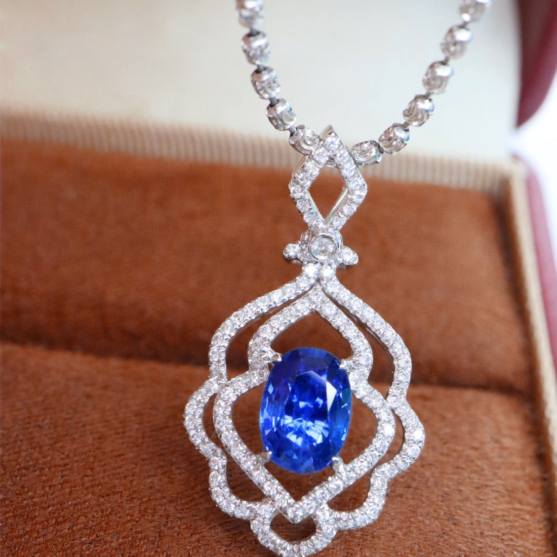 14k Gold 1.43 Ctw Natural Sapphire & Diamond Pendant( Without Chain ): Ref:231001222 // gold content:14k gold // main gemstone:sapphire // shape:oval // carat weight:1. 1ct // color:blue // treatment:natural // // adjacent gemstone 2 : diamond // shape:round // carat