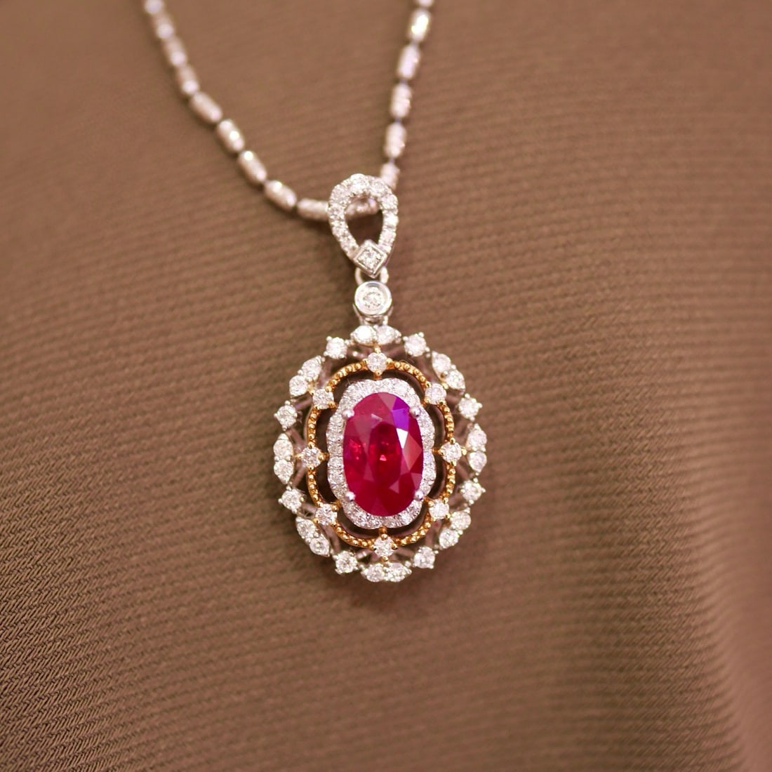 14k Gold 1.37 Ctw Natural Ruby & Diamond Pendant( Without Chain ): Ref:231002024 // gold content:14k gold // main gemstone:ruby // shape:oval // carat weight:1. 05ct // color:red // treatment:natural // // adjacent gemstone 2 : diamond // shape:round // carat weight: