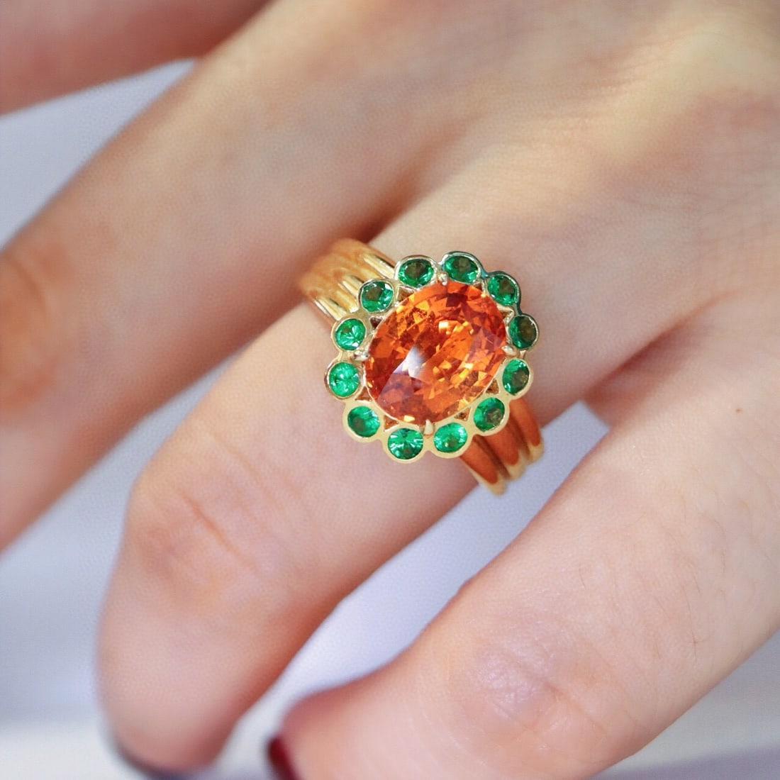14k Gold 2.14 Ct Natural Spessartine & Tsavorite Ring: Ref:231002048 // gold content:14k gold // ring size:7. 25us // // main gemstone:spessartine // shape:oval // carat weight:2. 14ct // color:orange // treatment:natural // // adjacent gemstone 2 :