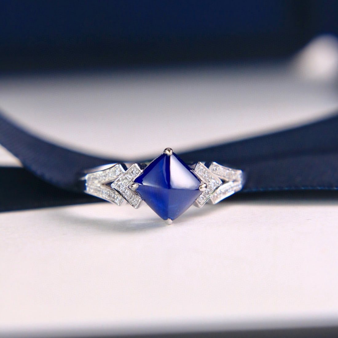 14k Gold 2.25 Ctw Natural Sapphire & Diamond Ring: Ref:231002073 // gold content:14k gold // ring size:7. 25us // // main gemstone:sapphire // shape:suger-loaf // carat weight:2. 15ct // color:royal blue // treatment:natural // // adjacent gemstone 2