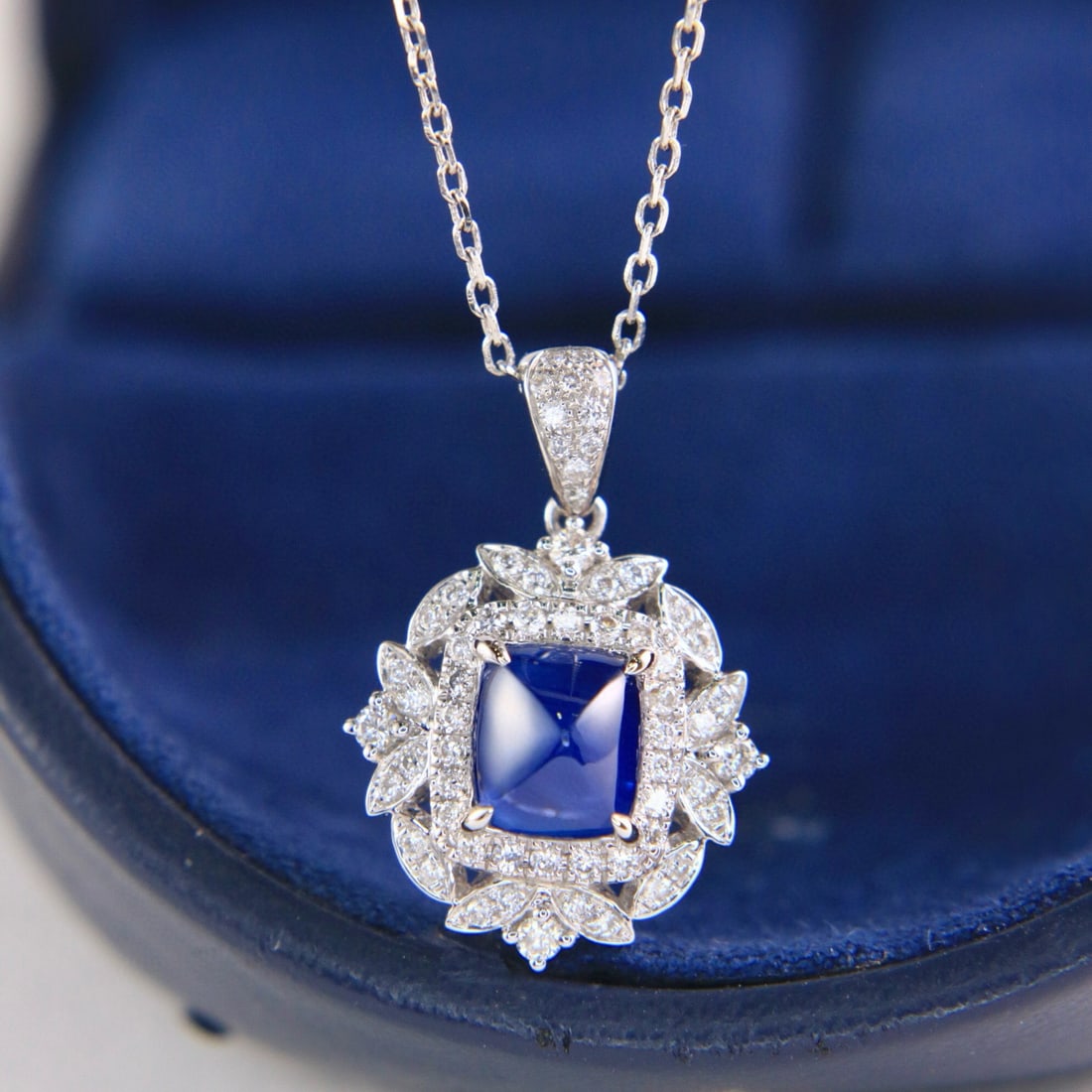 14k Gold 2.17 Ctw Natural Sapphire & Diamond Pendant( Without Chain ): Ref:231002074 // gold content:14k gold // main gemstone:sapphire // shape:suger-loaf // carat weight:1. 78ct // color:blue // treatment:natural // // adjacent gemstone 2 : diamond // shape:round //