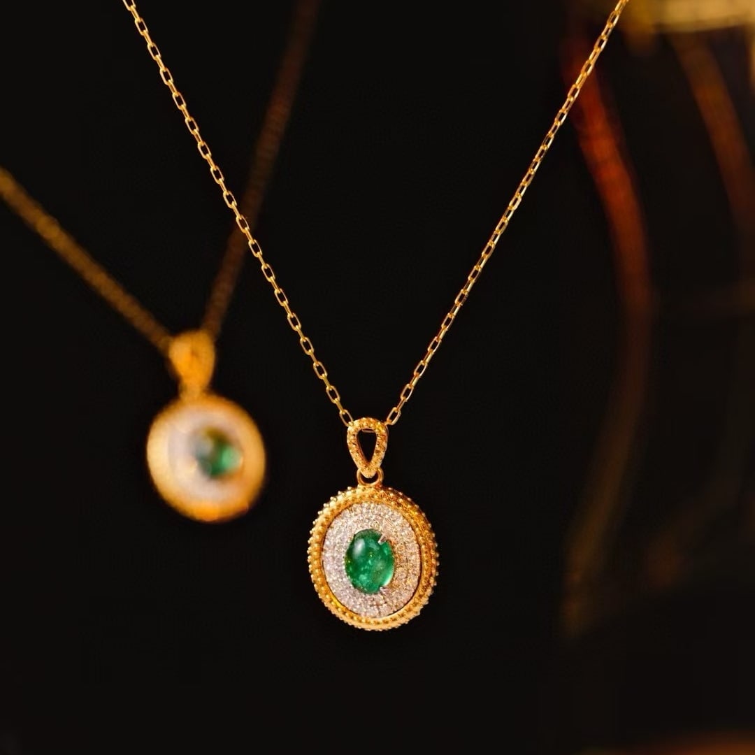14k Gold 0.66 Ctw Natural Emerald & Diamond Pendant( Without Chain ): Ref:231002140 // gold content:14k gold // main gemstone:emerald // shape:oval // carat weight:0. 48ct // color:green // treatment:natural // // adjacent gemstone 2 : diamond // shape:round // carat