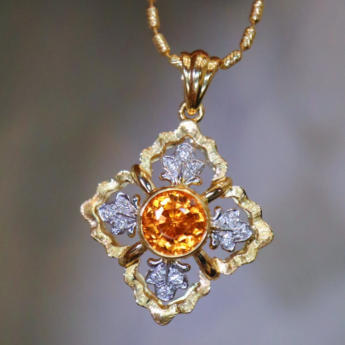 14k Gold 1.13 Ct Natural Spessartine & Diamond Pendant( Without Chain ): Ref:231002148 // gold content:14k gold // main gemstone:spessartine // shape:round // carat weight:1. 13ct // color:orange // treatment:natural // cut grade:g // // adjacent gemstone 2 : diamond //