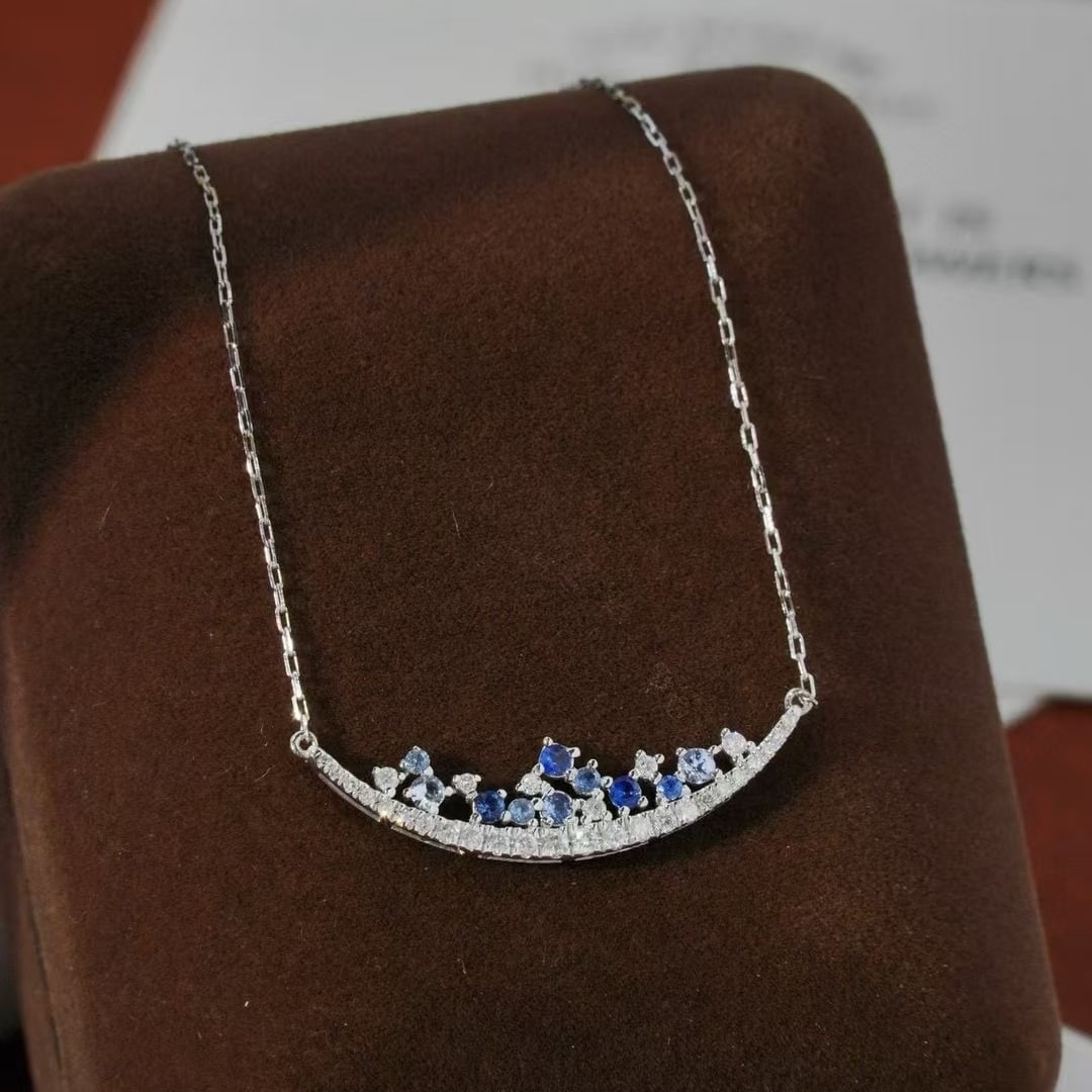 14k Gold 0.5 Ct Natural Sapphire & Diamond Necklace: Ref:231002201 // gold content:14k gold // main gemstone:sapphire & diamond // shape:round // carat weight:0. 5ct // color:blue & h // treatment:natural // cut grade:g // Condition: New Low Estimate: