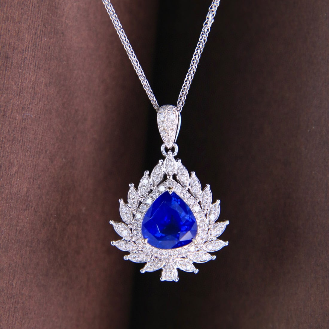 14k Gold 1.72 Ctw Natural Sapphire & Diamond Pendant( Without Chain ): Ref:231002225 // gold content:14k gold // main gemstone:sapphire // shape:pear // carat weight:1. 53ct // color:royal blue // treatment:natural // // adjacent gemstone 2 : diamond // shape:round //