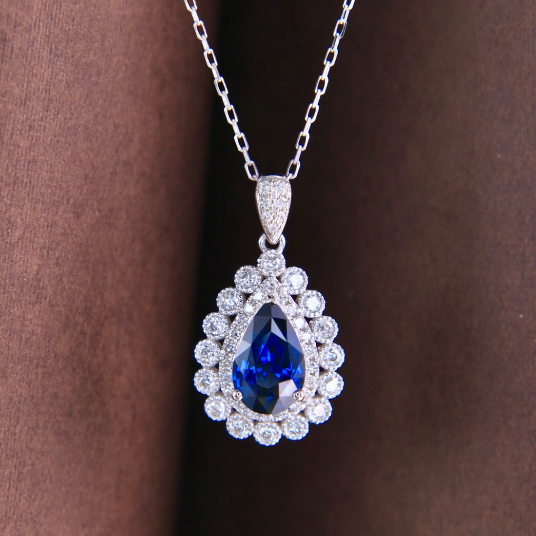 14k Gold 1.46 Ctw Natural Sapphire & Diamond Pendant( Without Chain ): Ref:231002227 // gold content:14k gold // main gemstone:sapphire // shape:pear // carat weight:1. 18ct // color:royal blue // treatment:natural // // adjacent gemstone 2 : diamond // shape:round //