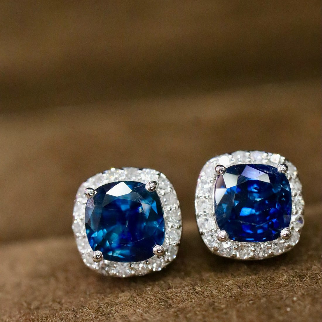 14k Gold 2.26 Ctw Natural Sapphire & Diamond Earrings: Ref:231002250 // gold content:14k gold // main gemstone:sapphire // shape:cushion // carat weight:2. 05ct // color:royal blue // treatment:natural // // adjacent gemstone 2 : diamond // shape:round