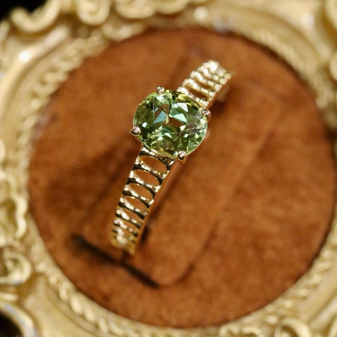 14k Gold 1.03 Ct Natural Tourmaline Ring: Ref:231002255 // gold content:14k gold // ring size:7. 25us // // main gemstone:tourmaline // shape:oval // carat weight:1. 03ct // color:green // treatment:natural // Condition: New Low Estimate: