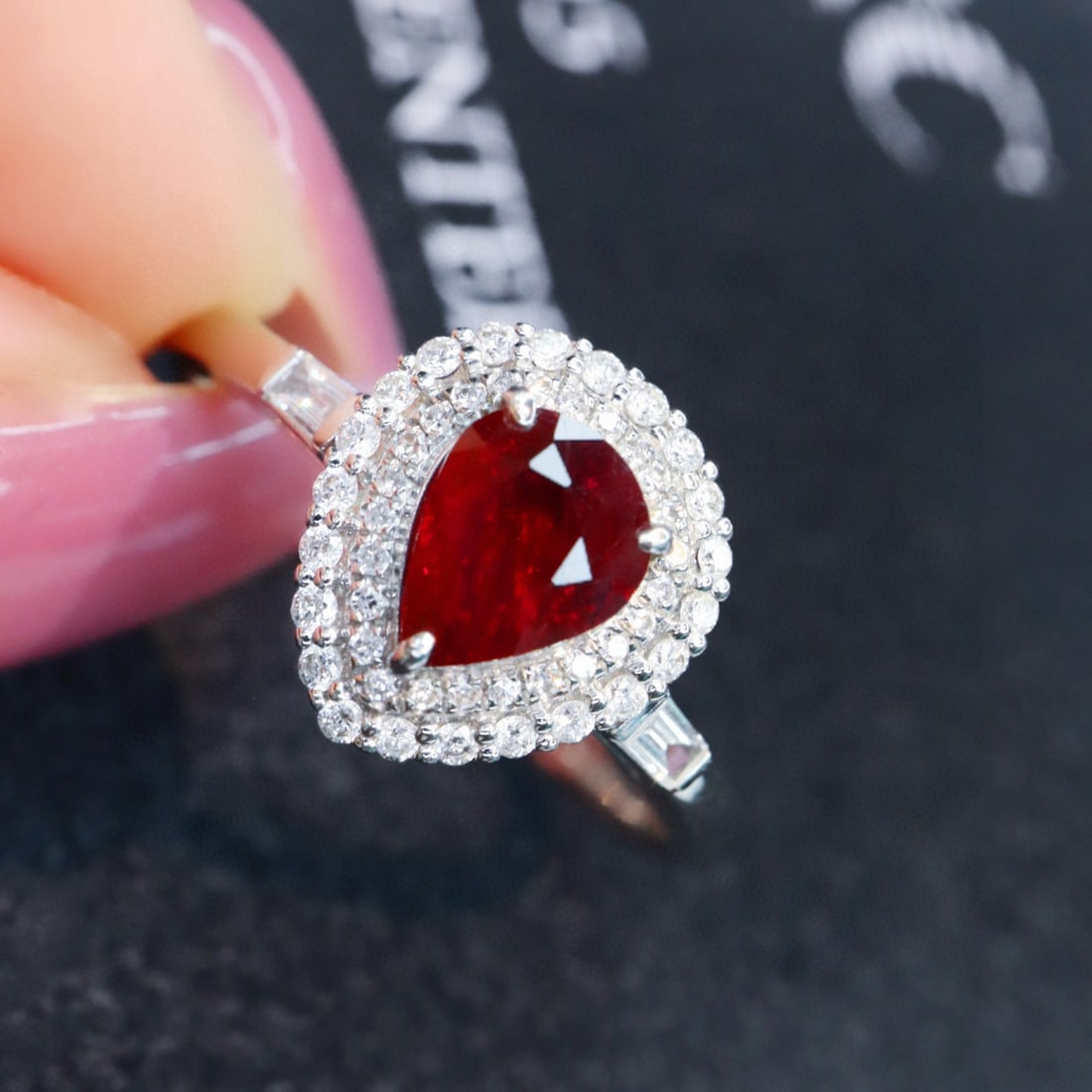 14k Gold 1.31 Ctw Natural Ruby & Diamond Ring: Ref:231002276 // gold content:14k gold // ring size:7. 25us // // main gemstone:ruby // shape:pear // carat weight:1. 08ct // color:pigeonblood red // treatment:natural // // adjacent gemstone 2 :