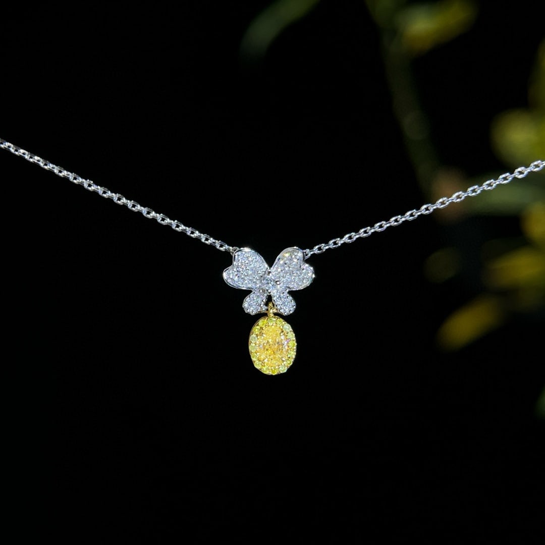 14k Gold 0.38 Ctw Natural Yellow Diamond & Diamond Necklace: Ref:231002303 // gold content:14k gold // main gemstone:yellow diamond // shape:oval // carat weight:0. 25ct // color:yellow // treatment:natural // // adjacent gemstone 2 : diamond // shape:round //