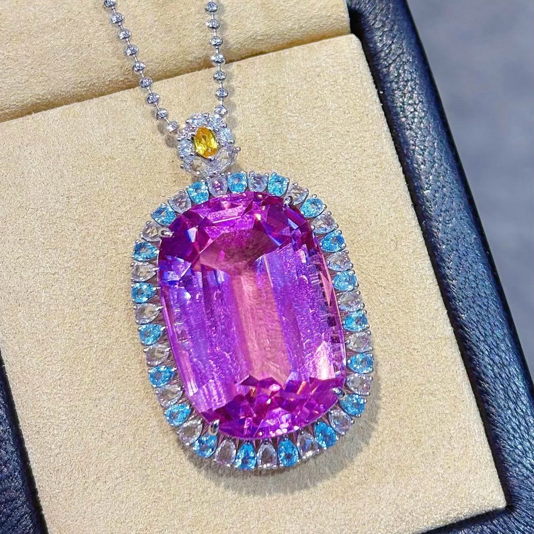 14k Gold 50.05 Ctw Natural Kunzite & Sapphire Pendant( Without Chain ): Ref:231002326 // gold content:14k gold // main gemstone:kunzite // shape:cushion // carat weight:48. 6ct // color:purple // treatment:natural // // adjacent gemstone 2 : sapphire // shape:pear //