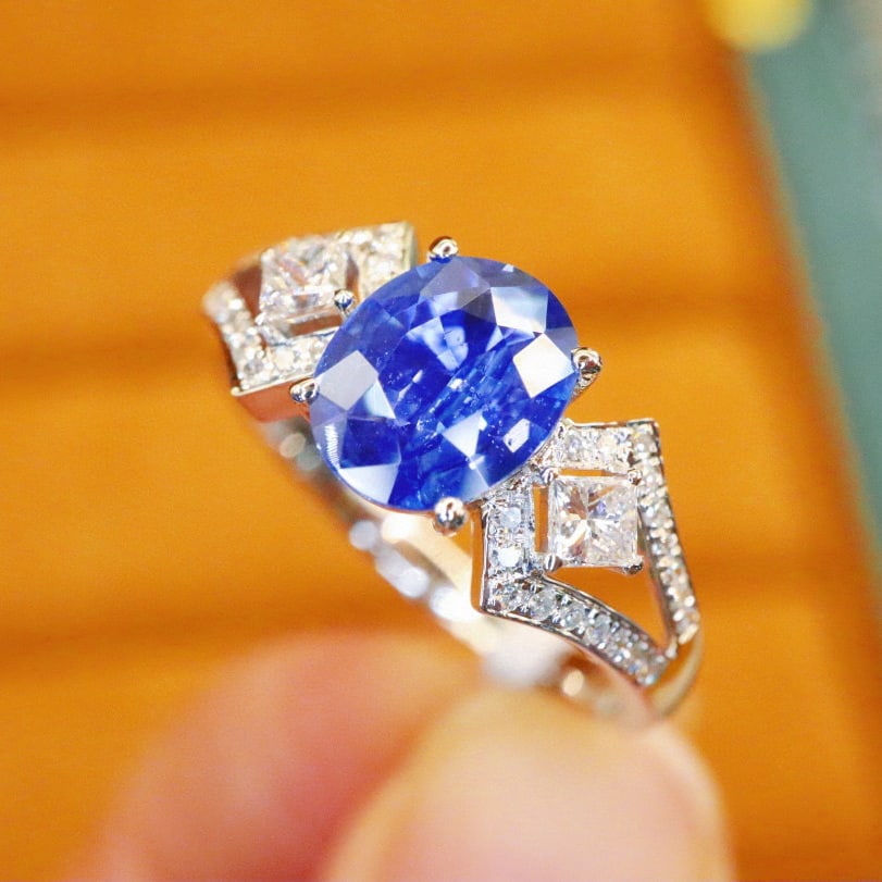 14k Gold 1.30 Ctw Natural Sapphire & Diamond Ring: Ref:231002347 // gold content:14k gold // ring size:7. 25us // // main gemstone:sapphire // shape:oval // carat weight:1. 01ct // color:cornflower blue // treatment:natural // // adjacent gemstone 2