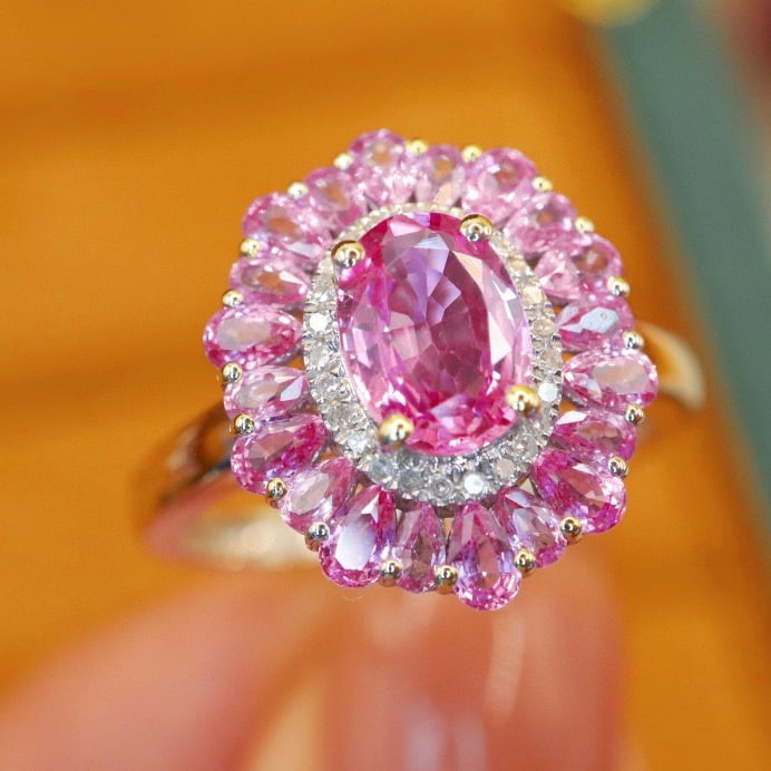 14k Gold 2.08 Ctw Natural Padparadscha Sapphire & Sapphire Ring: Ref:231002368 // gold content:14k gold // ring size:7. 25us // // main gemstone:padparadscha sapphire // shape:oval // carat weight:0. 98ct // color:orangish pink // treatment:natural // // adjacent
