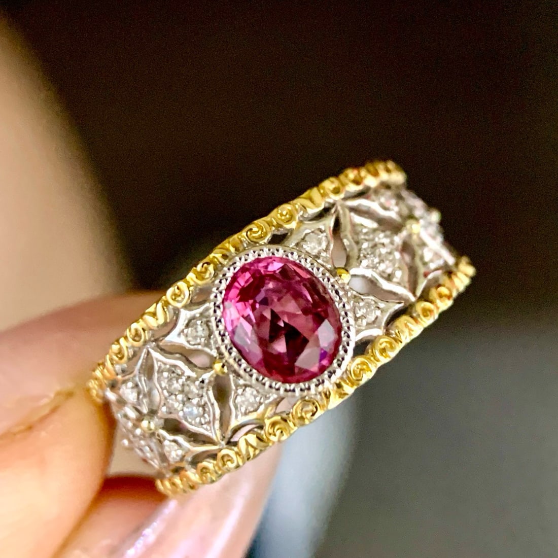 14k Gold 0.73 Ctw Natural Padparadscha Sapphire & Diamond Ring: Ref:231002374 // gold content:14k gold // ring size:7. 25us // // main gemstone:padparadscha sapphire // shape:oval // carat weight:0. 61ct // color:orangish pink // treatment:natural // // adjacent
