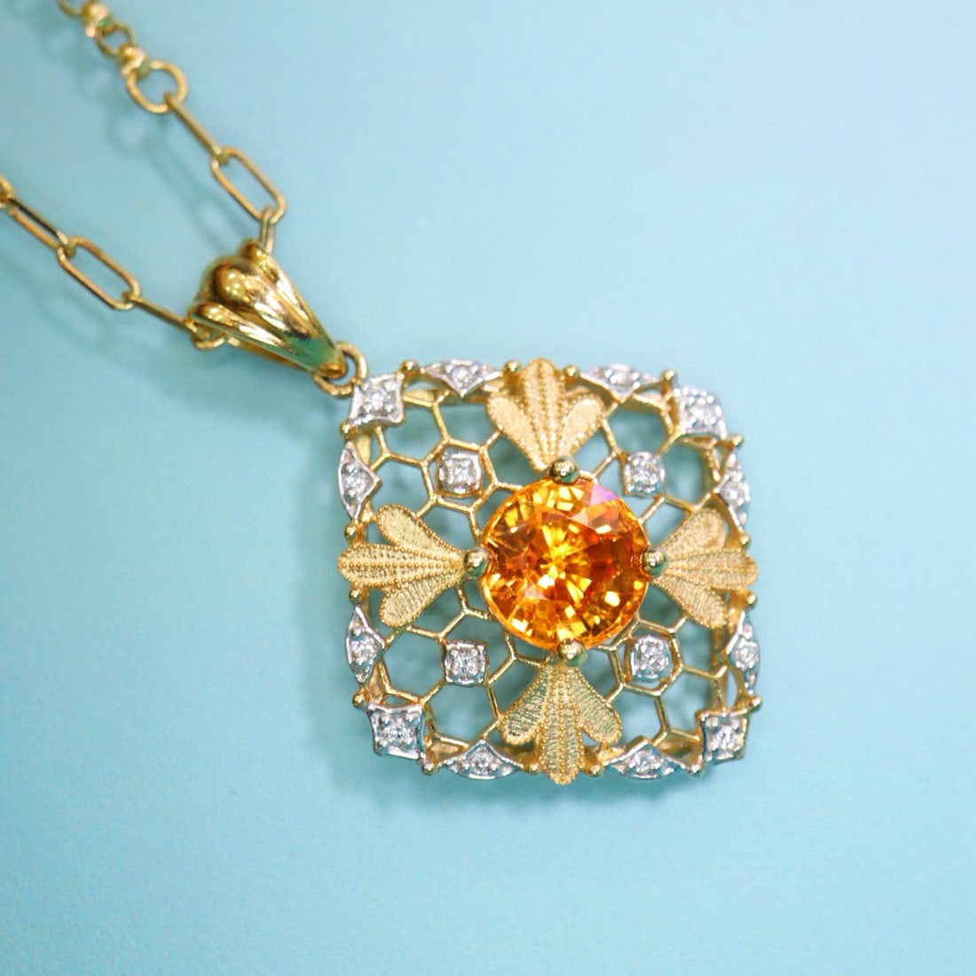 14k Gold 1.26 Ctw Natural Spessartine & Diamond Pendant( Without Chain ): Ref:231002401 // gold content:14k gold // main gemstone:spessartine // shape:round // carat weight:1. 20ct // color:orange // treatment:natural // cut grade:g // // adjacent gemstone 2 : diamond //