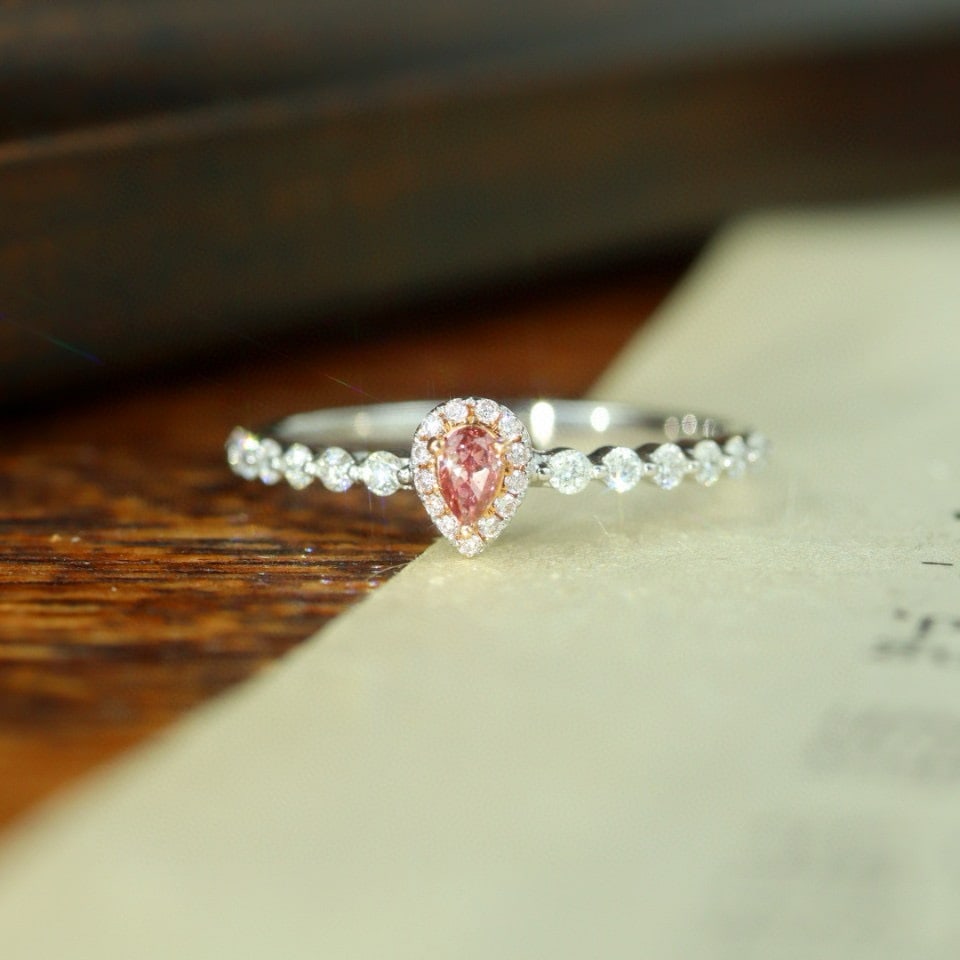 14k Gold 0.27 Ctw Natural Pink Diamond & Diamond Ring: Ref:231002418 // gold content:14k gold // ring size:7. 25us // // main gemstone:pink diamond // shape:pear // carat weight:0. 08ct // color:pink // treatment:natural // // adjacent gemstone 2 :