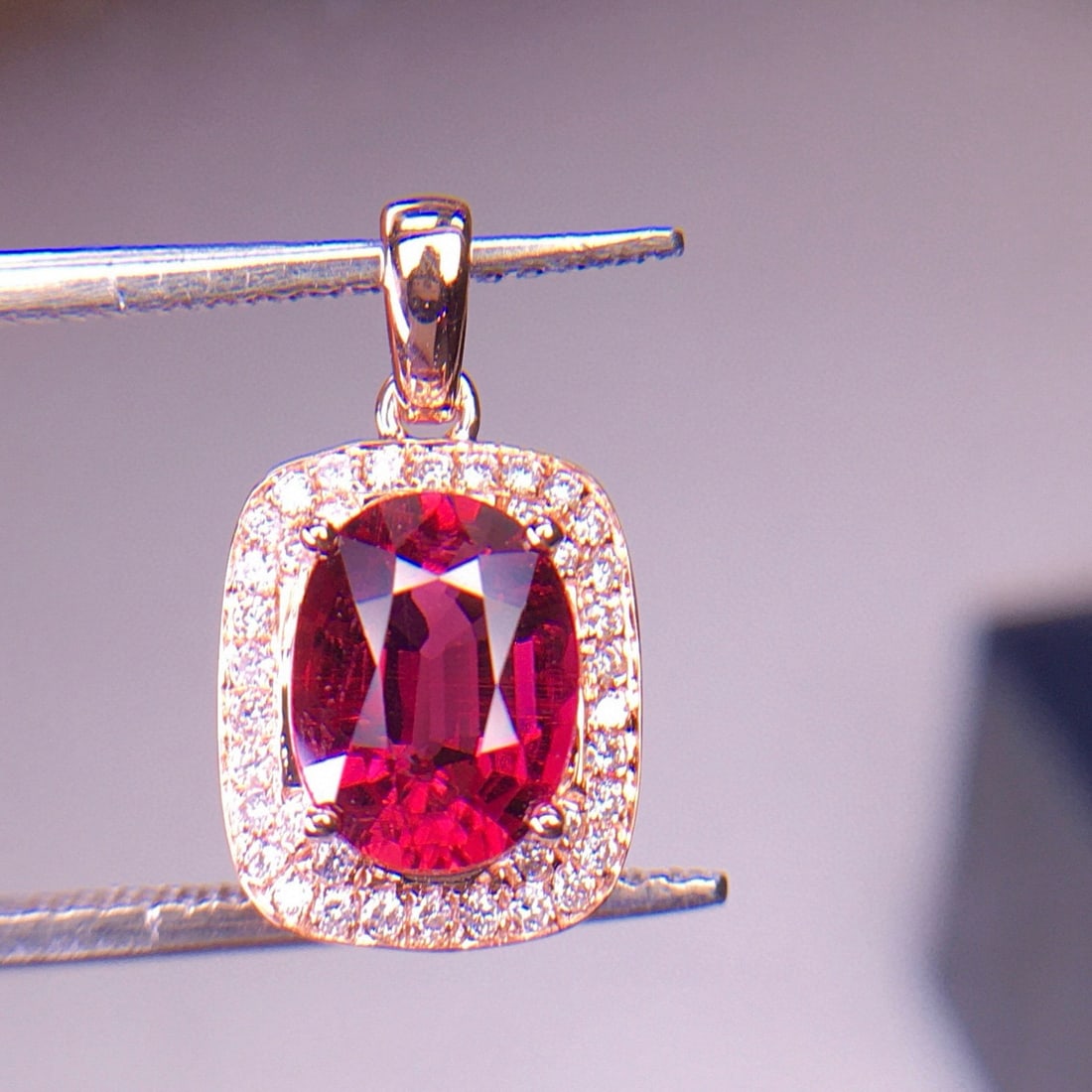 14k Gold 1.65 Ct Natural Tourmaline & Diamond Pendant( Without Chain ): Ref:231002442 // gold content:14k gold // main gemstone:tourmaline // shape:oval // carat weight:1. 65ct // color:red // treatment:natural // // adjacent gemstone 2 : diamond // shape:round //