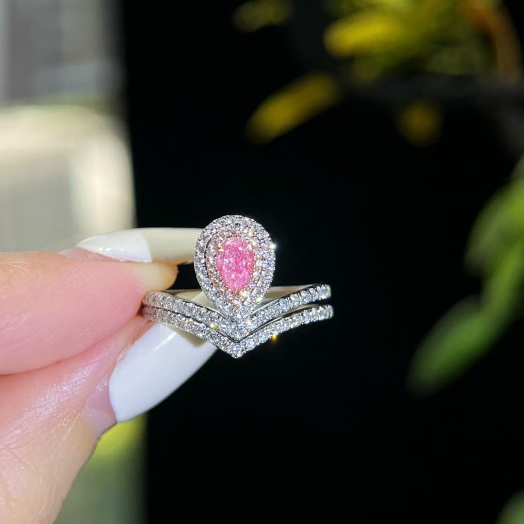 14k Gold 0.84 Ctw Natural Pink Diamond & Diamond Ring: Ref:231002446 // gold content:14k gold // ring size:7. 25us // // main gemstone:pink diamond // shape:pear // carat weight:0. 3ct // color:pink // treatment:natural // // adjacent gemstone 2 :