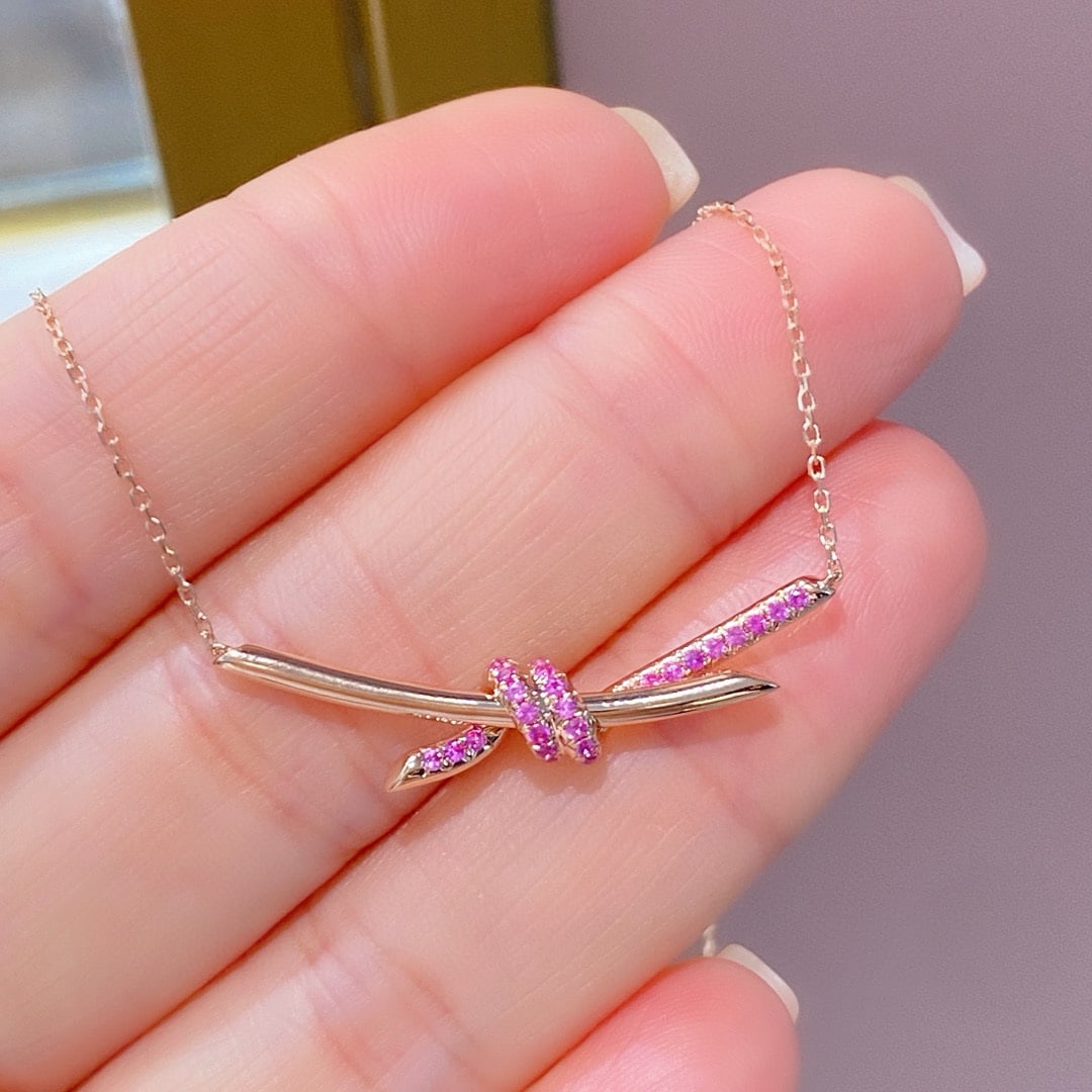 14k Gold 0.20 Ct Natural Sapphire Necklace: Ref:231002450 // gold content:14k gold // main gemstone:sapphire // shape:round // carat weight:0. 20ct // color:pink // treatment:natural // cut grade:g // Condition: New Low Estimate: 2200.00 High