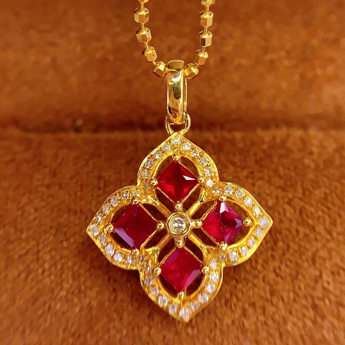 14k Gold 0.6 Ct Vivid Red Natural Ruby & Diamond Pendant( Without Chain ): Ref:231106134 // gold content:14k gold // main gemstone:ruby // shape:princess // carat weight:0. 6ct // color:vivid red // treatment:natural // // adjacent gemstone 2 : diamond // number of stones:45