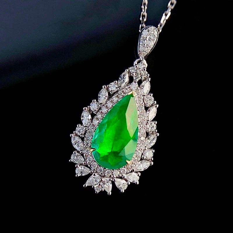 14k Gold 2.05 Ctw Vivid Green Natural Emerald & Diamond Pendant( Without Chain ): Ref:231007008 // gold content:14k gold // main gemstone:emerald // shape:pear // carat weight:1. 38ct // color:vivid green // treatment:natural // // adjacent gemstone 2 : diamond // shape:multiply //