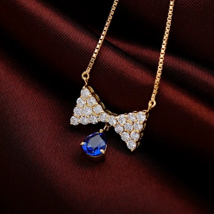 14k Gold 1.10 Ctw Natural Sapphire & Diamond Necklace: Ref:231007023 // gold content:14k gold // main gemstone:sapphire // shape:pear // carat weight:0. 60ct // color:blue // treatment:natural // // adjacent gemstone 2 : diamond // shape:round // carat we