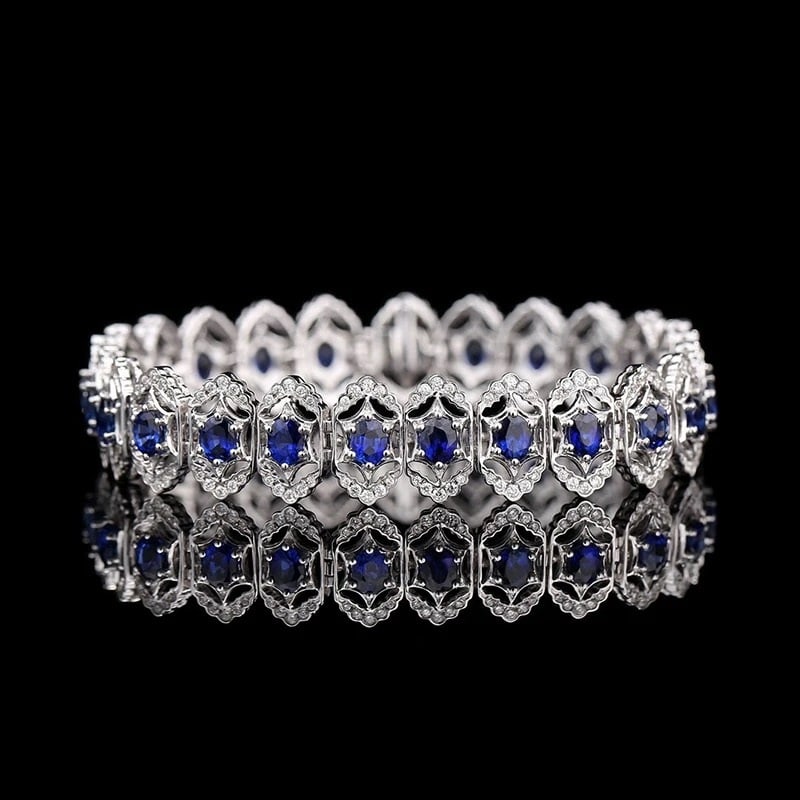 14k Gold 8.68 Ctw Natural Sapphire & Diamond Bracelet: Ref:231007038 // gold content:14k gold // main gemstone:sapphire // shape:oval // carat weight:7. 55ct // color:royal blue // treatment:natural // // adjacent gemstone 2 : diamond // shape:round // ca
