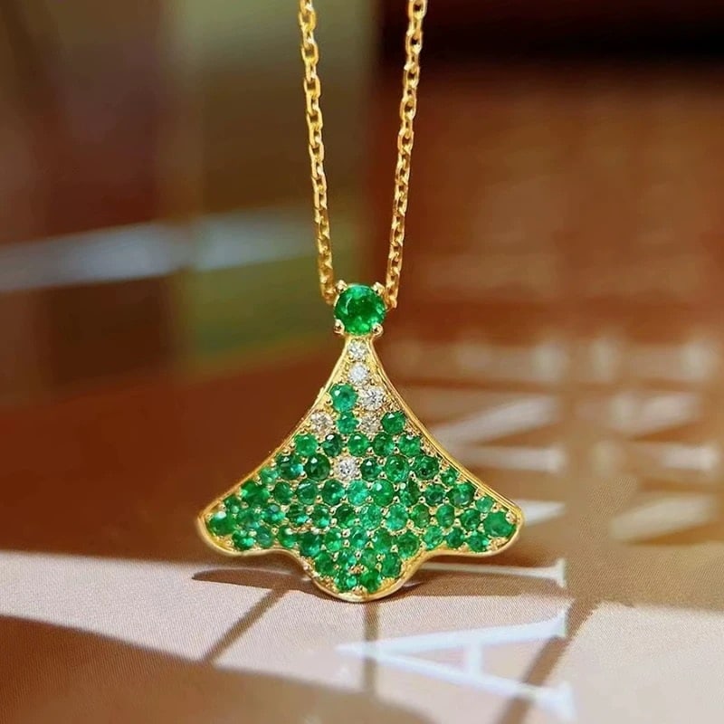 14k Gold 0.65 Ctw Natural Emerald & Diamond Necklace: Ref:231007045 // gold content:14k gold // main gemstone:emerald // shape:round // carat weight:0. 6ct // color:green // treatment:natural // cut grade:g // // adjacent gemstone 2 : diamond //