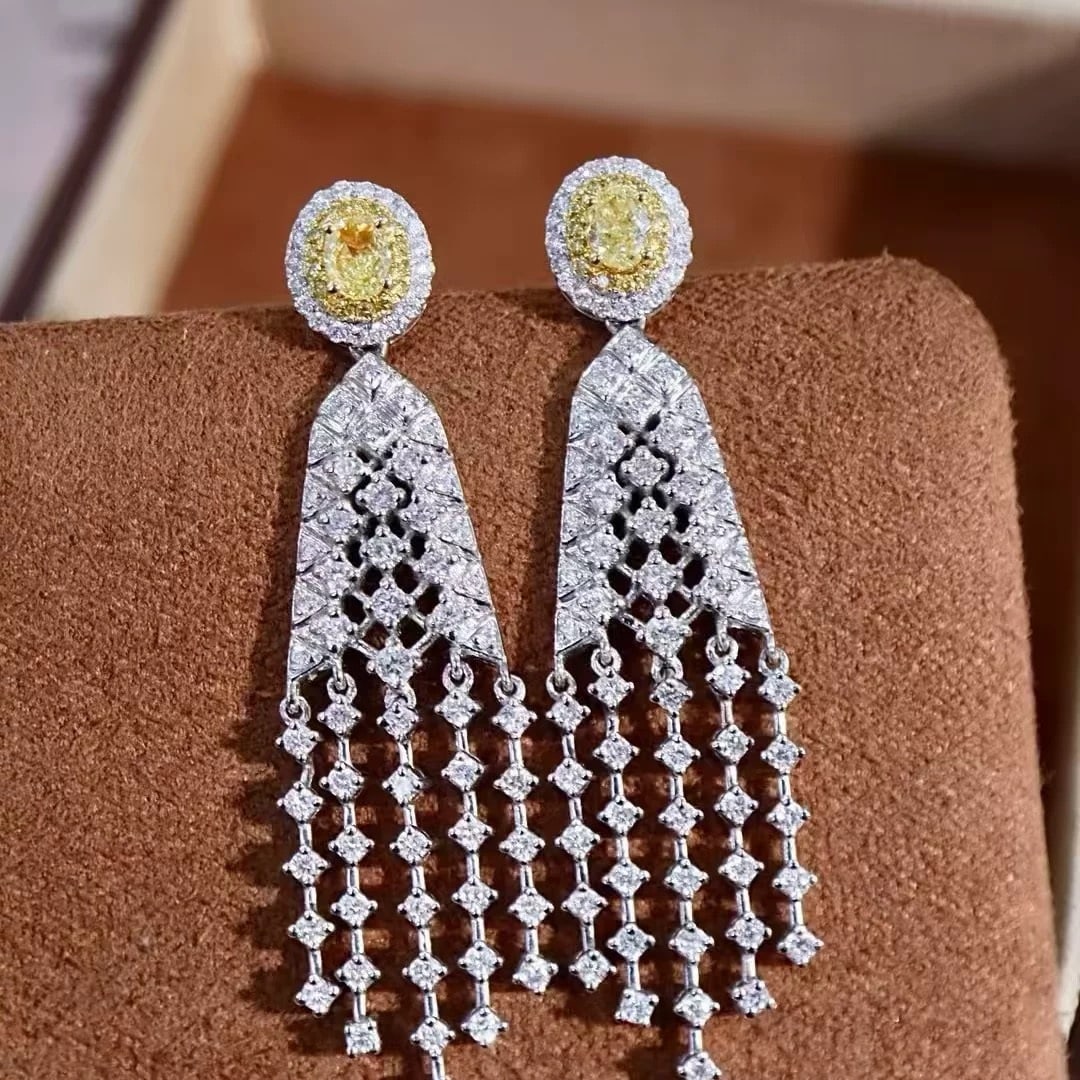 14k Gold 1.72 Ctw Natural Yellow Diamond & Diamond Earrings: Ref:231007057 // gold content:14k gold // main gemstone:yellow diamond // shape:oval // carat weight:0. 4ct // color:yellow // treatment:natural // // adjacent gemstone 2 : diamond // shape:round //