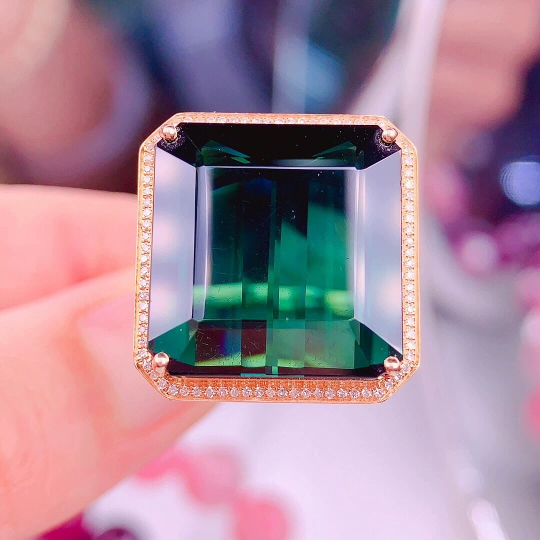 14k Gold 26.8 Ct Natural Tourmaline & Diamond Ring: Ref:231007060 // gold content:14k gold // ring size:7. 25us // // main gemstone:tourmaline // shape:octagonal // carat weight:26. 8ct // color:green // treatment:natural // // adjacent gemstone 2 : di