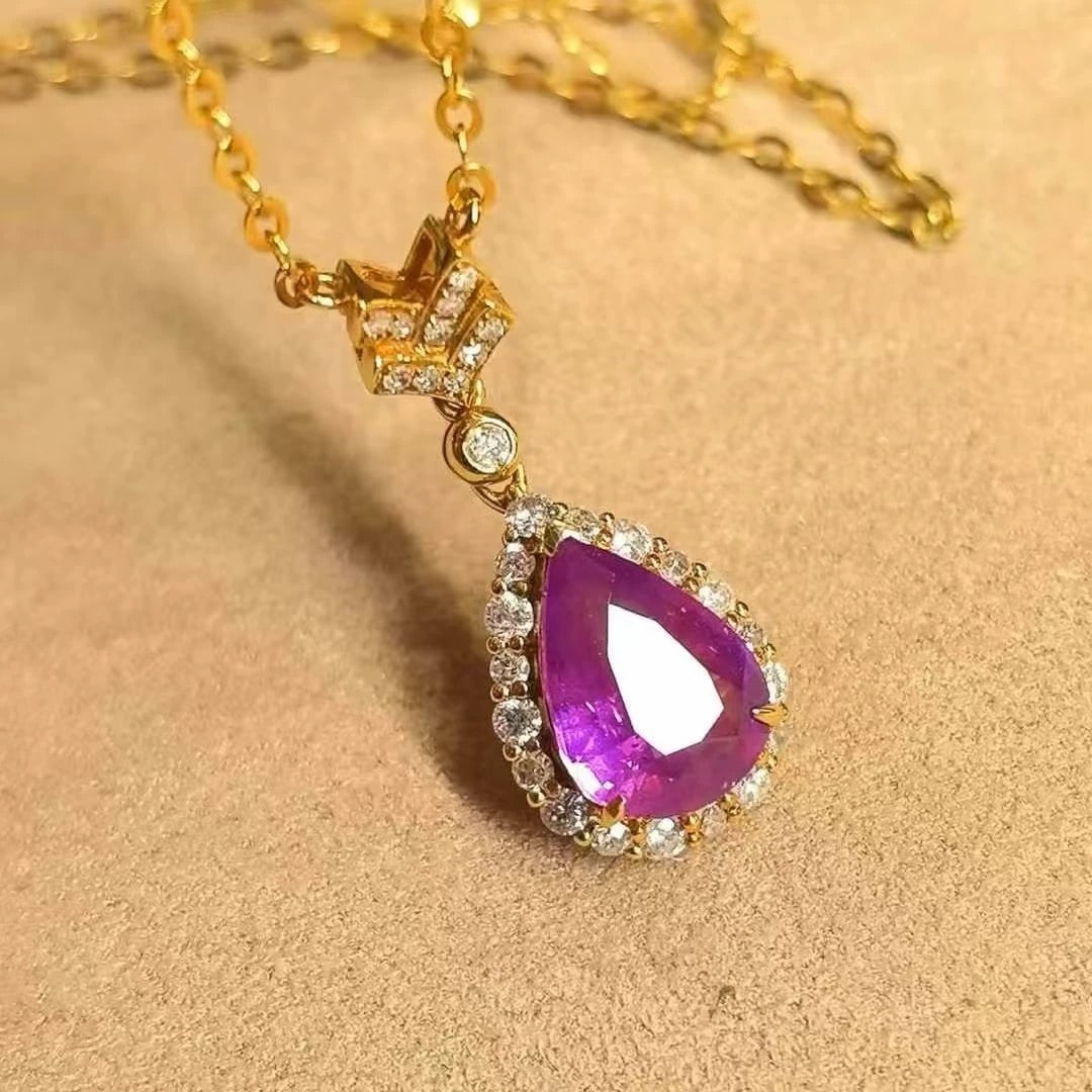 14k Gold 1.90 Ctw Natural Sapphire & Diamond Necklace: Ref:231007085 // gold content:14k gold // main gemstone:sapphire // shape:pear // carat weight:1. 66ct // color:purple // treatment:natural // // adjacent gemstone 2 : diamond // shape:round // carat 