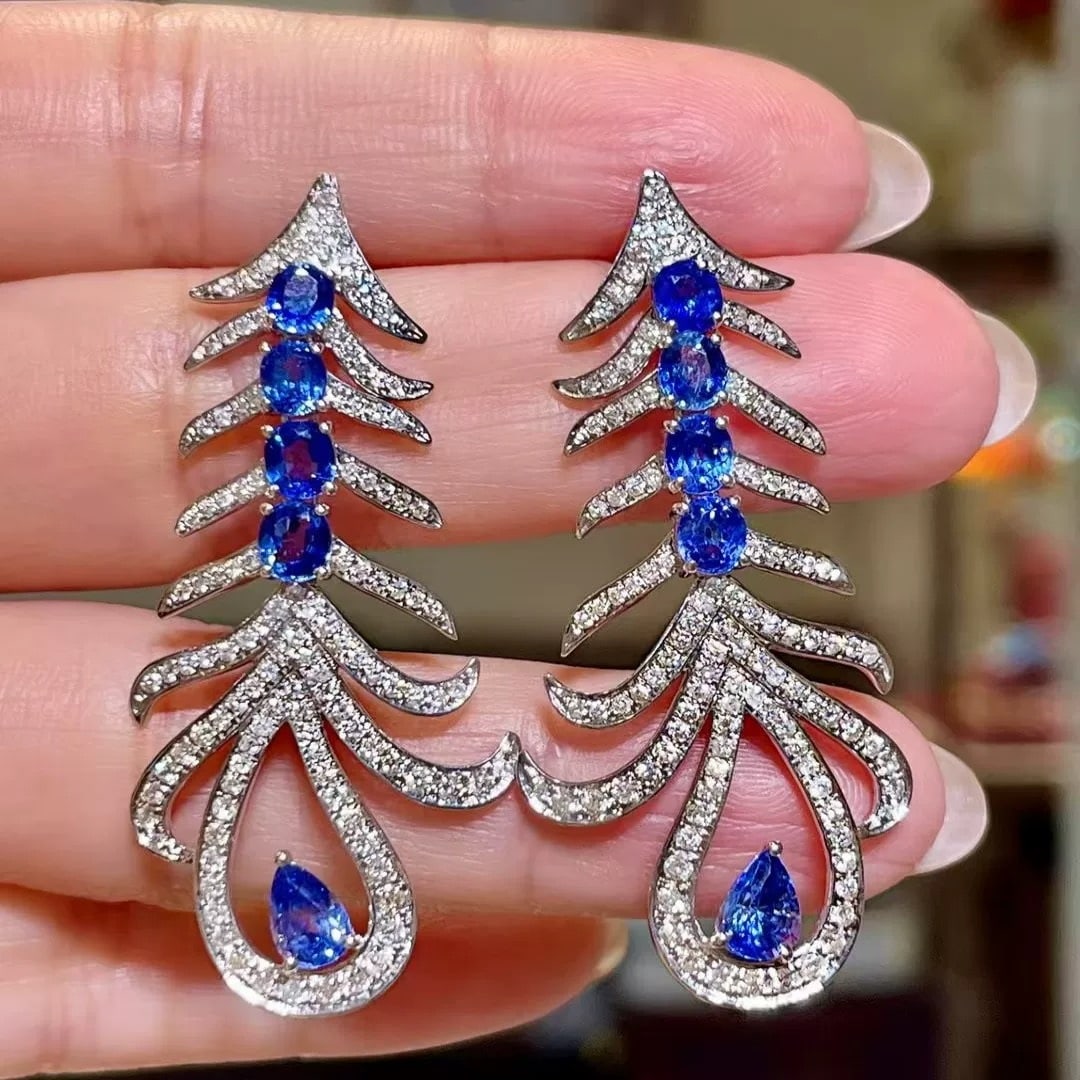 14k Gold 5.25 Ctw Natural Sapphire & Diamond Earrings: Ref:231007104 // gold content:14k gold // main gemstone:sapphire // shape:oval & pear // carat weight:3. 88ct // color:blue // treatment:natural // // adjacent gemstone 2 : diamond // shape:round //