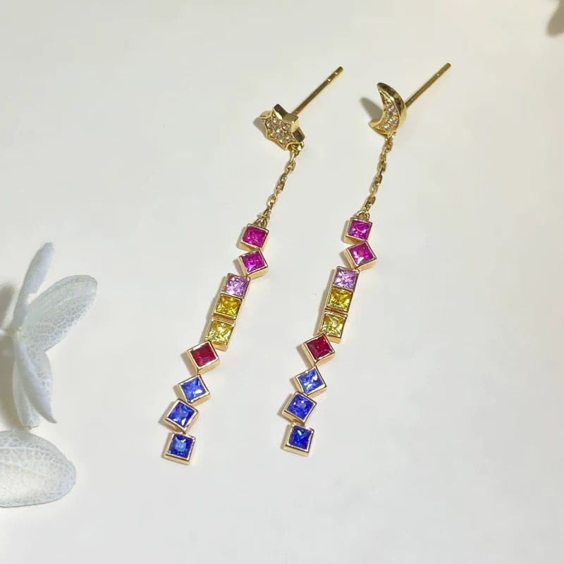 14k Gold 1.24 Ct Natural Sapphire Earrings: Ref:231007111 // gold content:14k gold // main gemstone:sapphire // shape:princess // carat weight:1. 24ct // color:color // treatment:natural // Condition: New Low Estimate: 2200.00 High Estimate: