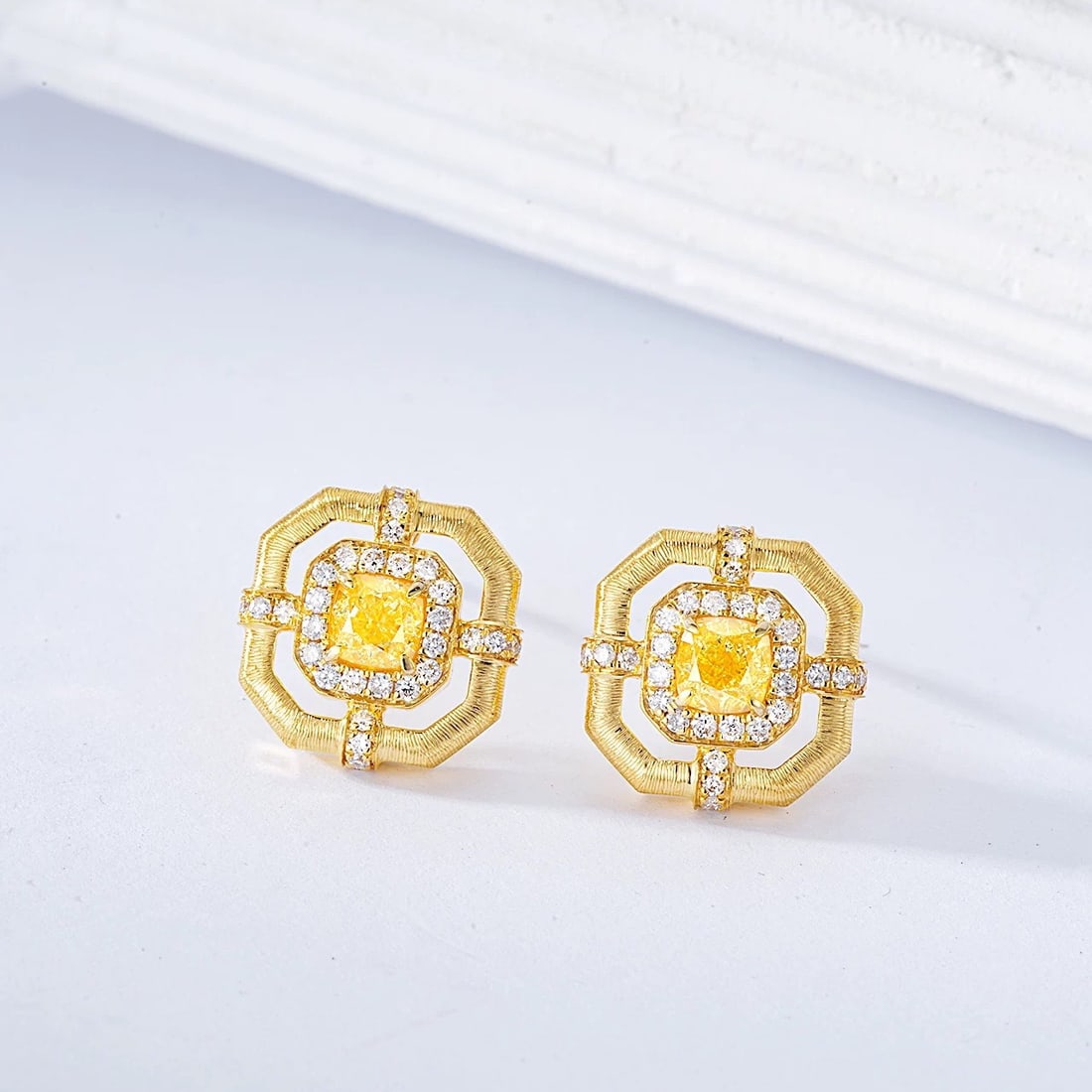14k Gold 0.8 Ctw Natural Yellow Diamond & Diamond Earrings: Ref:231007117 // gold content:14k gold // main gemstone:yellow diamond // shape:cushion // carat weight:0. 6ct // color:yellow // treatment:natural // // adjacent gemstone 2 : diamond // shape:round
