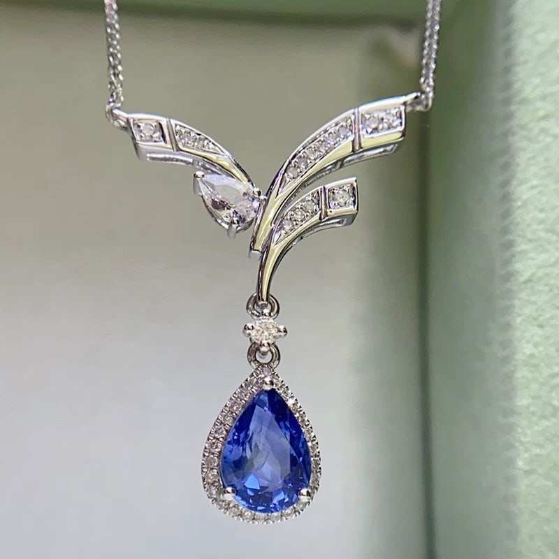 14k Gold 1 Ct Natural Sapphire & Diamond Necklace: Ref:231007128 // gold content:14k gold // main gemstone:sapphire // shape:pear // carat weight:1ct // color:blue // treatment:natural // // adjacent gemstone 2 : diamond // shape:multiply // clarity