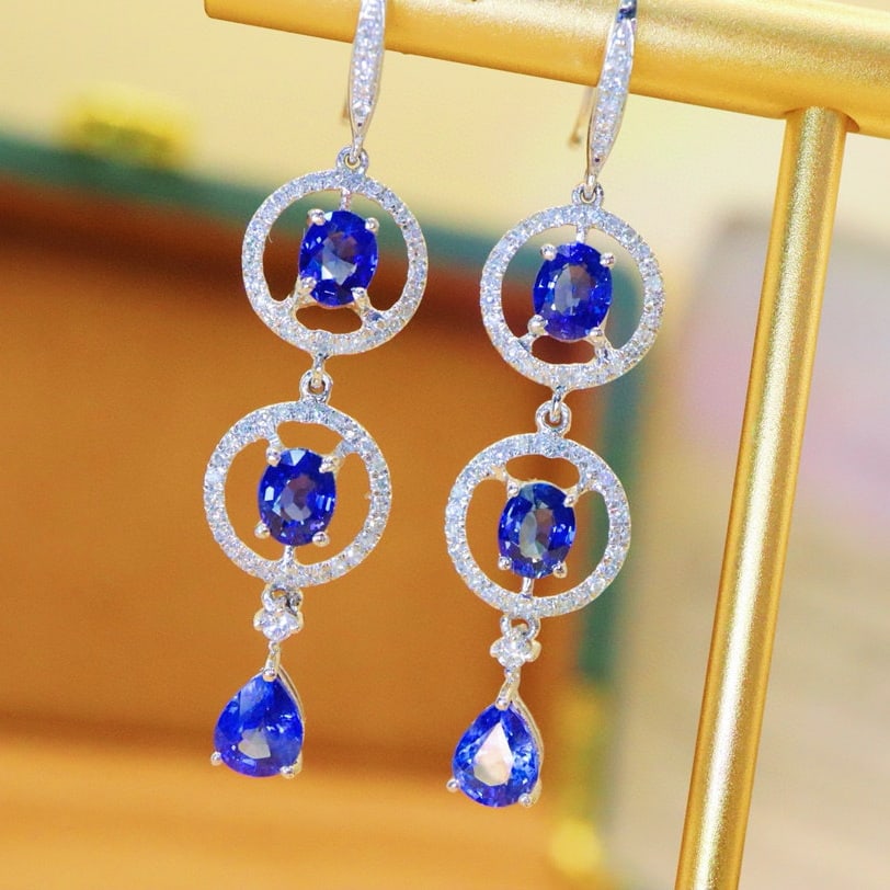 14k Gold 2.93 Ctw Natural Sapphire & Diamond Earrings: Ref:231007164 // gold content:14k gold // main gemstone:sapphire // shape:oval & pear // carat weight:2. 55ct // color:blue // treatment:natural // // adjacent gemstone 2 : diamond // number of