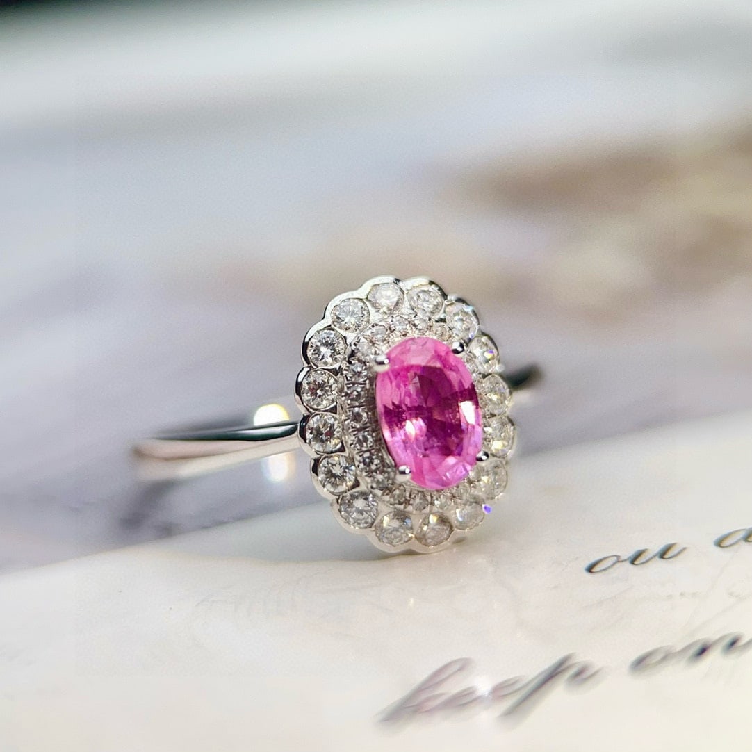 14k Gold 1.2 Ctw Natural Padparadscha Sapphire & Diamond Ring: Ref:231007179 // gold content:14k gold // ring size:7. 25us // // main gemstone:padparadscha sapphire // shape:oval // carat weight:0. 9ct // color:pink // treatment:natural // // adjacent gemstone 2