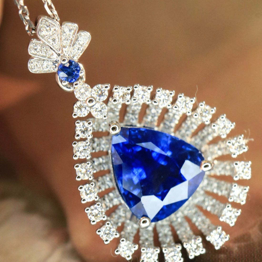 14k Gold 2.60 Ctw Natural Sapphire & Diamond Pendant( Without Chain ): Ref:231007186 // gold content:14k gold // main gemstone:sapphire // shape:pear // carat weight:2. 15ct // color:blue // treatment:natural // // adjacent gemstone 2 : diamond // shape:round // carat we