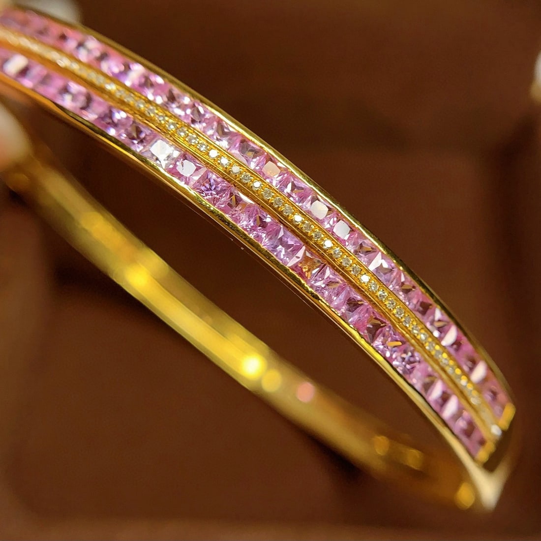 14k Gold 6 Ct Natural Sapphire & Diamond Bangle: Ref:231007188 // gold content:14k gold // main gemstone:sapphire // shape:princess // carat weight:6ct // color:pink // treatment:natural // // adjacent gemstone 2 : diamond // number of stones:64 // 