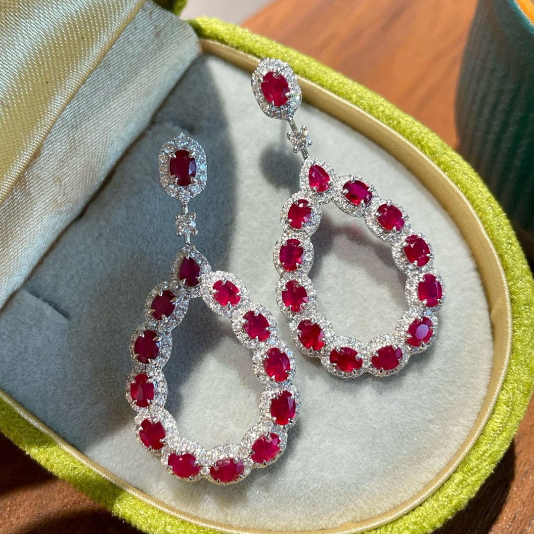 14k Gold 4.70 Ctw Natural Ruby & Diamond Earrings: Ref:231007194 // gold content:14k gold // main gemstone:ruby // shape:oval & pear // carat weight:3. 70ct // color:red // treatment:natural // // adjacent gemstone 2 : diamond // shape:round // carat 