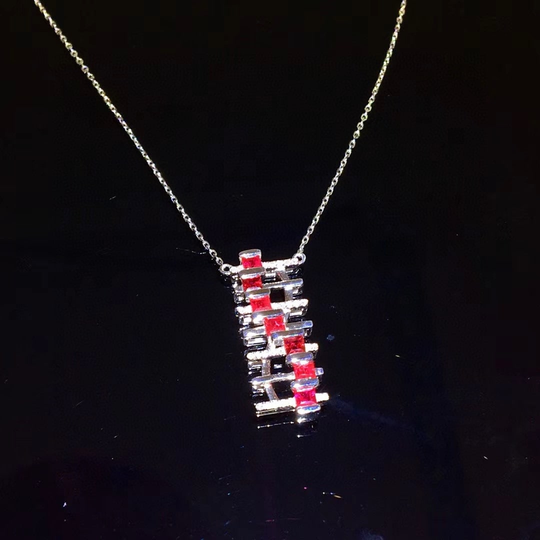 14k Gold 1.16 Ctw Natural Ruby & Diamond Necklace: Ref:231007203 // gold content:14k gold // main gemstone:ruby // shape:rectangle // carat weight:0. 6ct // color:red // treatment:natural // // adjacent gemstone 2 : diamond // shape:round // carat