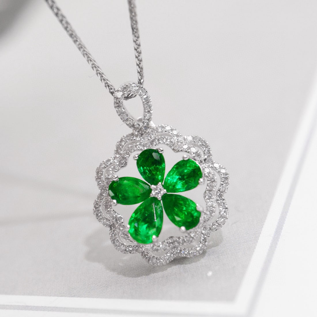 14k Gold 1.6 Ctw Natural Emerald & Diamond Pendant( Without Chain ): Ref:231007205 // gold content:14k gold // main gemstone:emerald // shape:pear // carat weight:1. 3ct // color:green // treatment:natural // // adjacent gemstone 2 : diamond // shape:round // carat
