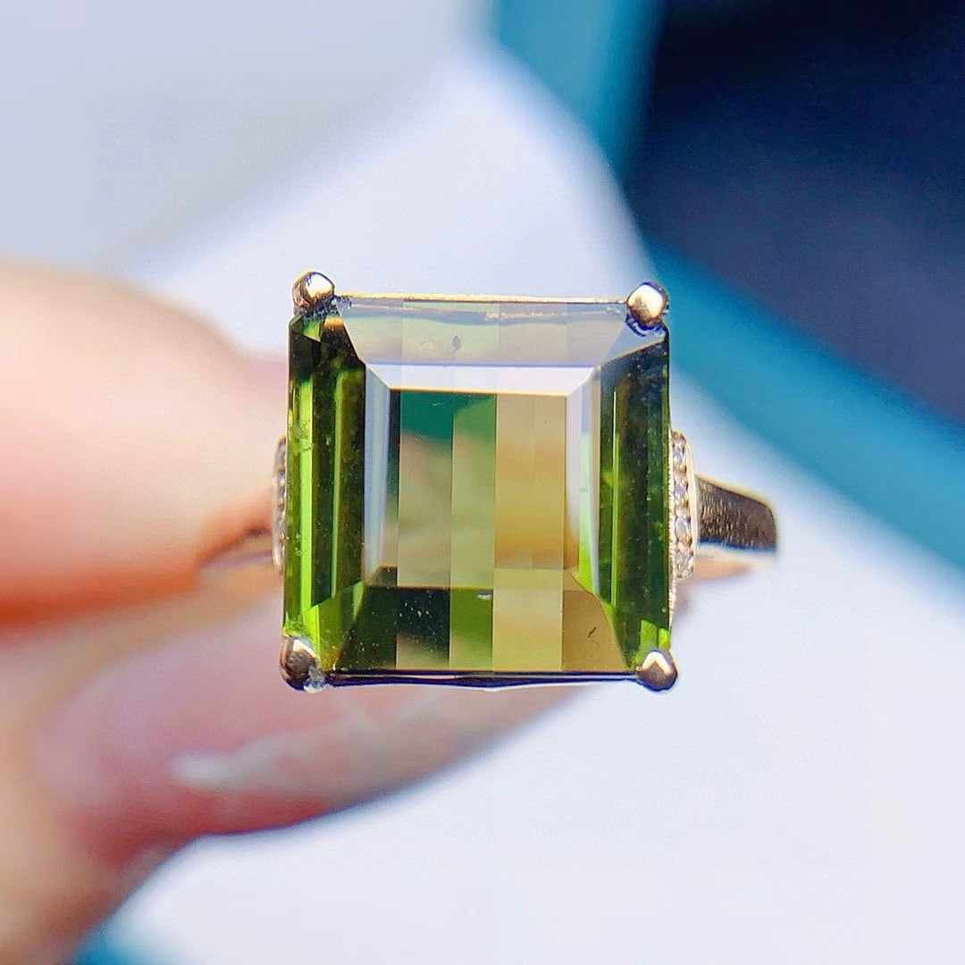 14k Gold 6.87 Ctw Natural Tourmaline & Diamond Ring: Ref:231007206 // gold content:14k gold // ring size:7. 25us // // main gemstone:tourmaline // shape:octagonal // carat weight:6. 85ct // color:green // treatment:natural // // adjacent gemstone 2 :