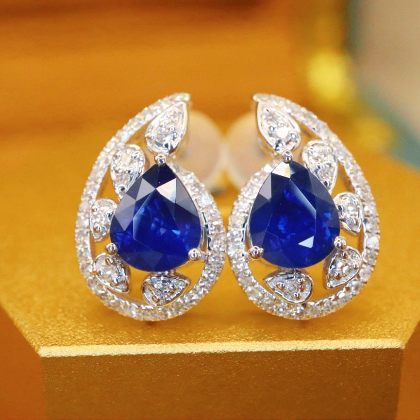 14k Gold 1.80 Ctw Natural Sapphire & Diamond Earrings: Ref:231008005 // gold content:14k gold // main gemstone:sapphire // shape:pear // carat weight:1. 55ct // color:royal blue // treatment:natural // // adjacent gemstone 2 : diamond // number of