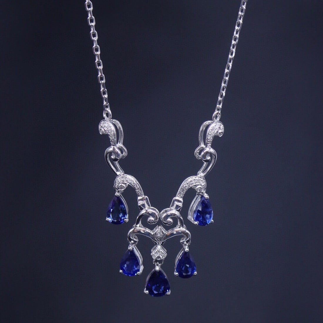 14k Gold 4.2 Ct Natural Sapphire & Diamond Necklace: Ref:231008026 // gold content:14k gold // main gemstone:sapphire // shape:pear // carat weight:4. 2ct // color:blue // treatment:natural // // adjacent gemstone 2 : diamond // number of stones:37 //