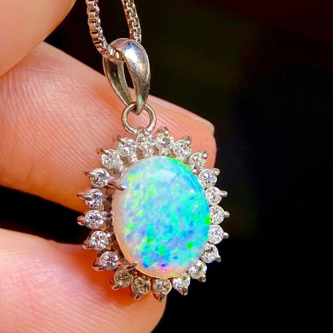 14k Gold 1.98 Ctw Natural Opal & Diamond Pendant( Without Chain ): Ref:231008061 // gold content:14k gold // main gemstone:opal // shape:oval // carat weight:1. 68ct // color:color // treatment:natural // // adjacent gemstone 2 : diamond // shape:round // carat