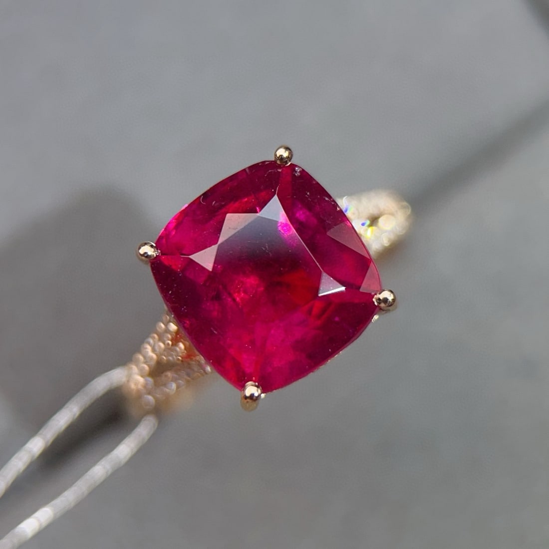 14k Gold 5.80 Ctw Natural Tourmaline & Diamond Ring: Ref:231008070 // gold content:14k gold // ring size:7. 25us // // main gemstone:tourmaline // shape:cushion // carat weight:5. 65ct // color:red // treatment:natural // // adjacent gemstone 2 :