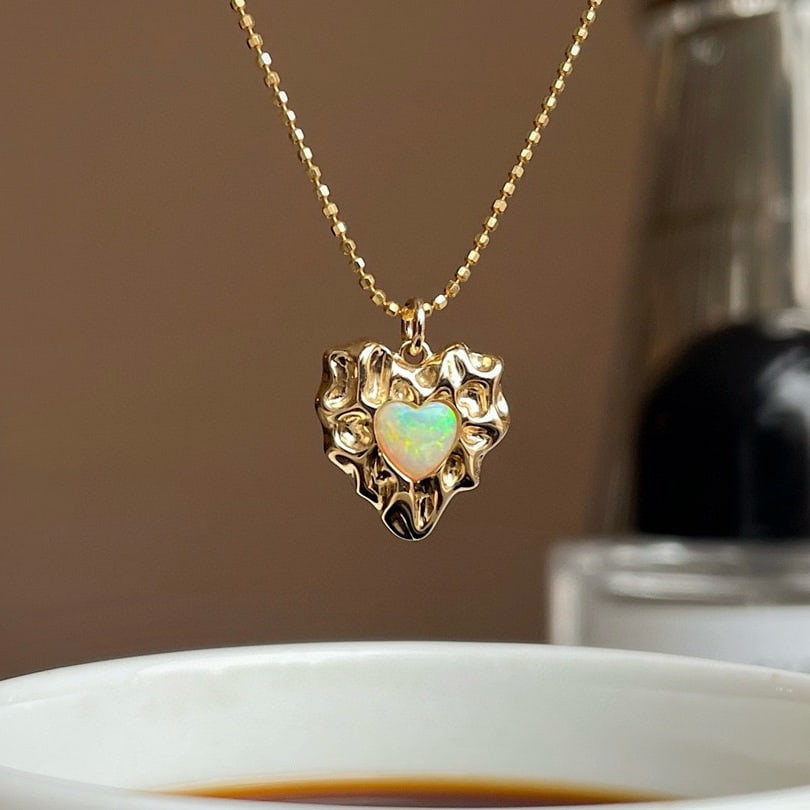 14k Gold 0.2 Ct Natural Tourmaline Pendant( Without Chain ): Ref:231008104 // gold content:14k gold // main gemstone:tourmaline // shape:heart // carat weight:0. 2ct // color:color // treatment:natural // Condition: New High Estimate: 2600 Low Estimate: 1800