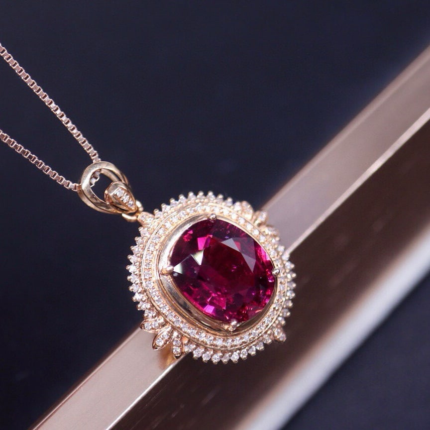14k Gold 4.62 Ct Natural Tourmaline & Diamond Pendant( Without Chain ): Ref:231008116 // gold content:14k gold // main gemstone:tourmaline // shape:oval // carat weight:4. 62ct // color:red // treatment:natural // // adjacent gemstone 2 : diamond // number of stones:104